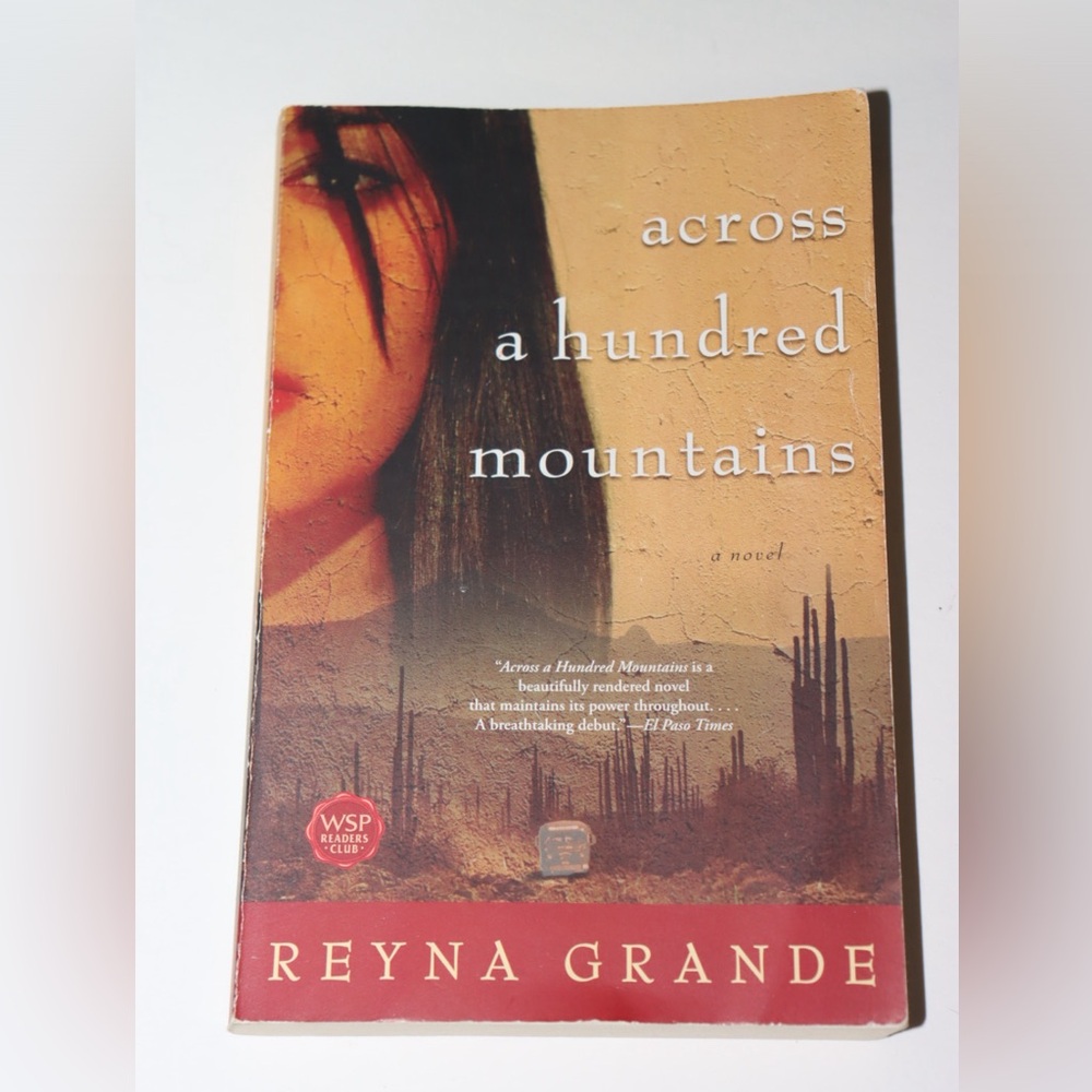 EUC Paperback book: Across a hundred mountains, by Reyna Grande
